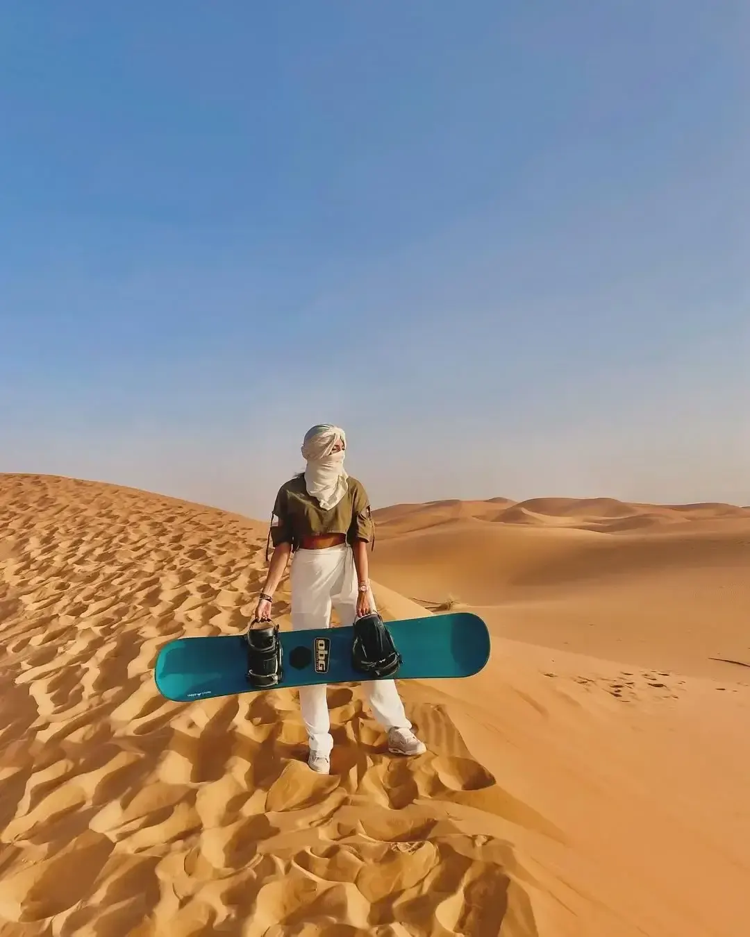 Sandboarding in Erg Chebbi